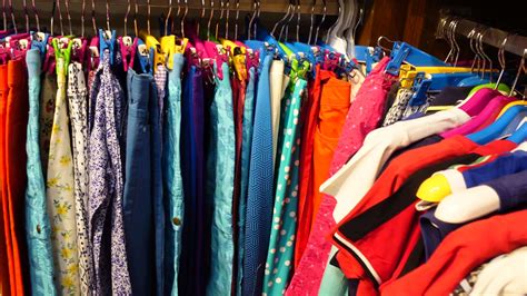 Used Clothes On Hangers In Second Hand Thrift Shop 22169420 Stock