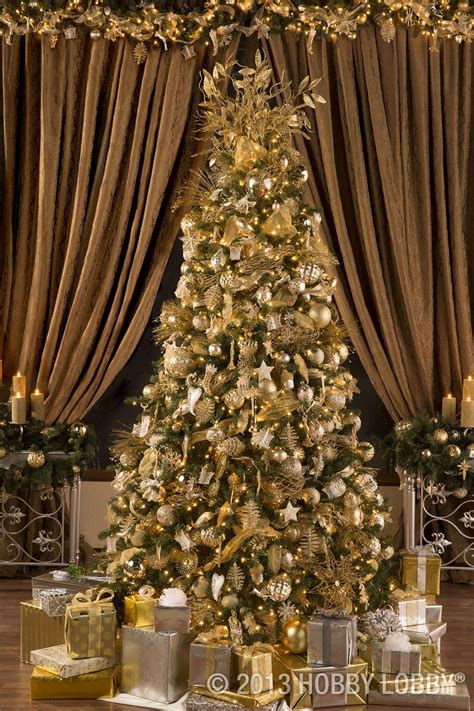 Make Your Christmas Tree Sparkle Bright With Gold And Silver Decorations Gold Christmas Tree