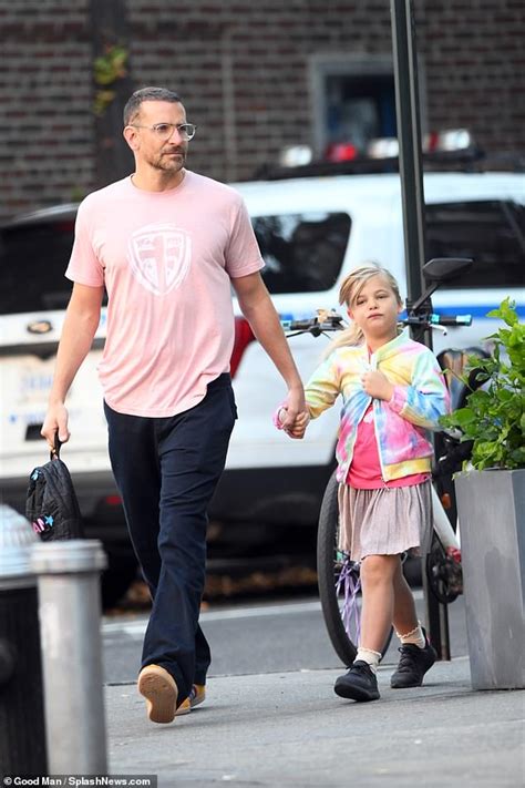 Bradley Cooper holds hands with daughter Lea in NYC while sporting same