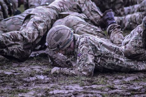 Group Of Soldiers Crawling On Mud Picture. Image: 109927687