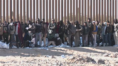 Migrants walk through closed border crossing in Arizona | 12news.com