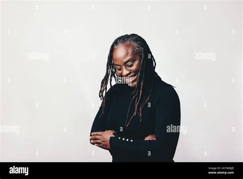 Happy Woman With Dreadlocks Smiling Cheerfully While Wearing Eyeglasses Professional Mature