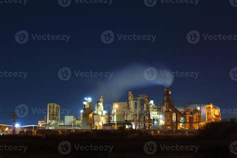 Factory at night 9556569 Stock Photo at Vecteezy