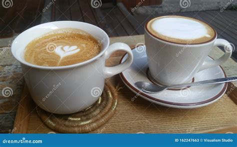 Two Different Types Of Milk Coffee In A White Cup Stock Image Image