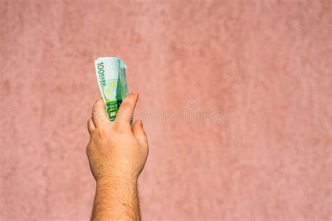 Hand Holding Showing Euro Money Or Giving Money Like Bribe Or Tips