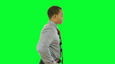 Green Screen Businessman Turns And Smiles At Camera Stock Video Footage