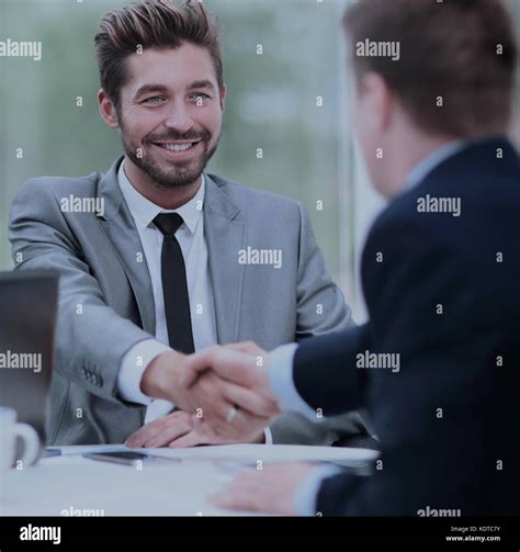 Business Handshake Two Business People Shaking Hands In Office Stock