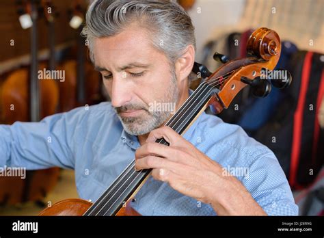 Mature Man Playing Cello Stock Photo Alamy