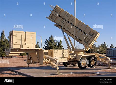 A Patriot missile battery labeled 'SCUD Buster' missile park outside ...