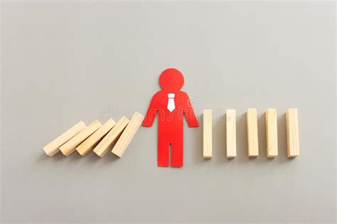 A Man Figure Stopping The Domino Effect Image Executive And Risk