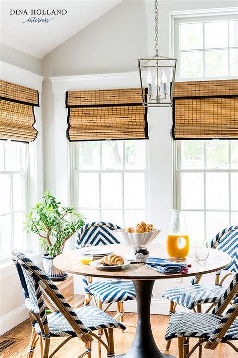 Blue Rattan Chevron Chairs With Tulip Table Transitional Dining Room