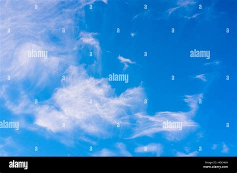 Cirrus and alto-stratus clouds in a blue sky Stock Photo - Alamy