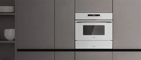 Компактный духовой шкаф с СВЧ Haier HMX-BDC399W – купить по цене 79 999 ...