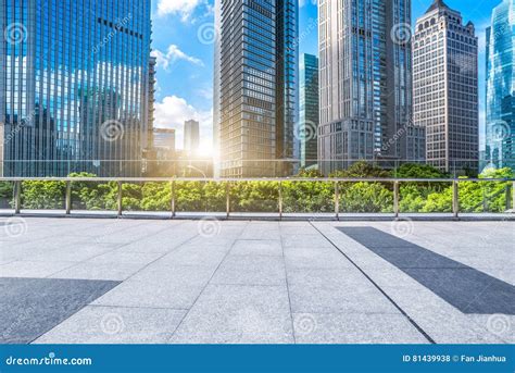 Empty Brick Floor With Modern Building In Background Stock Photo