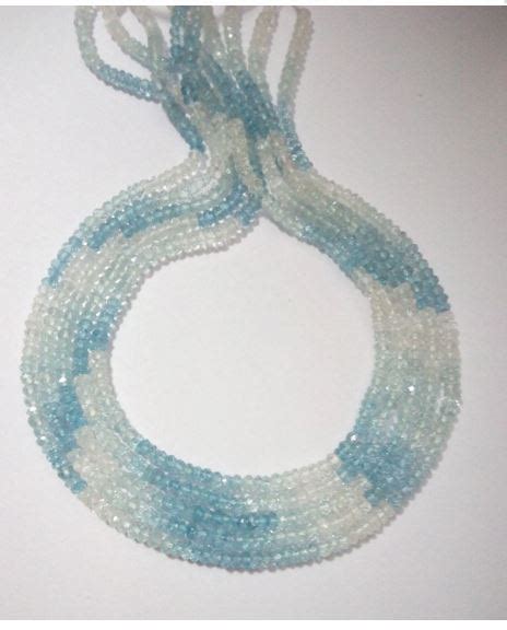 Aquamarine Shaded Machine Cut Faceted Rondell Bead At Best Price In Jaipur