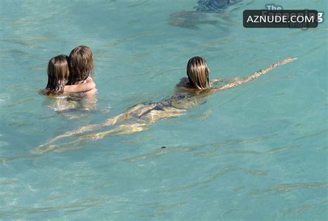 Alexis Ren Sexy Shows Off Her Amazing Figure Wearing A Hot Black Bikini At The Beach In St