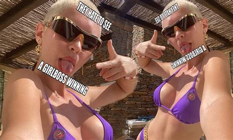 Iris Law Shows Off Her Sensational Physique In A Skimpy Purple Bikini While Relaxing In The