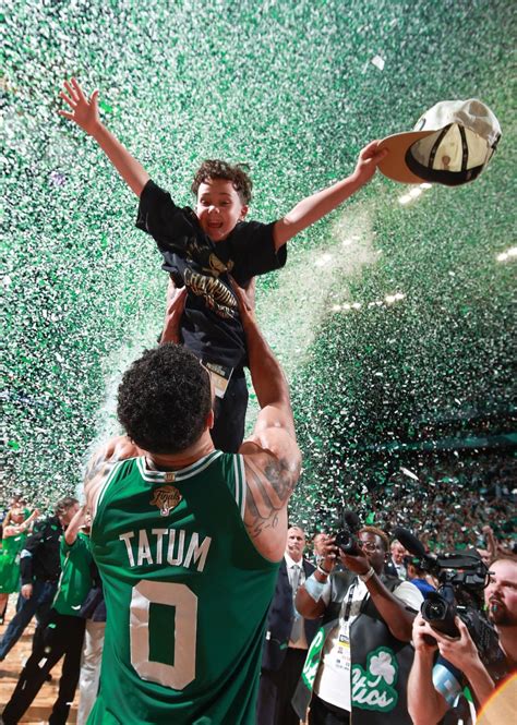 Jason Tatum and his son celebrate a championship. Credit: Nathaniel S ...