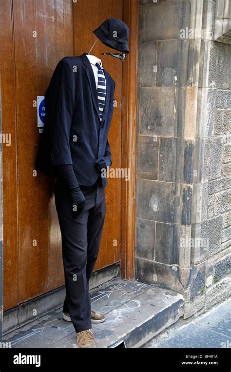 street performer performance mime artist dressed as invisible man ...