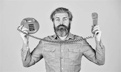 Premium Photo Lab Of Advertisement Brutal Guy With Telephone Mature