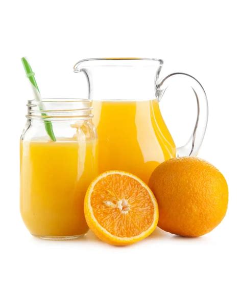 Jugo De Naranja En Jarra Y Naranjas Foto De Stock Karandaev