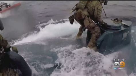 Watch Coast Guard Officers Leap Onto Moving Drug Sub Youtube