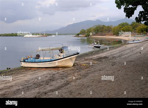 Boats at the sandy beach of Secret bay, Secret Bay, Gilimanuk, Bali ...