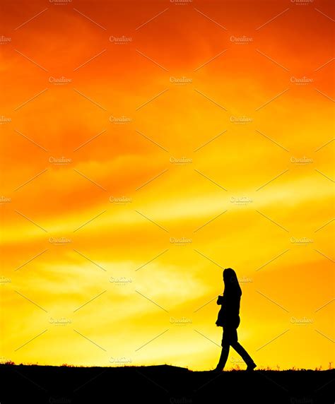 Woman at sunset silhouette featuring woman, walking, and silhouette ...