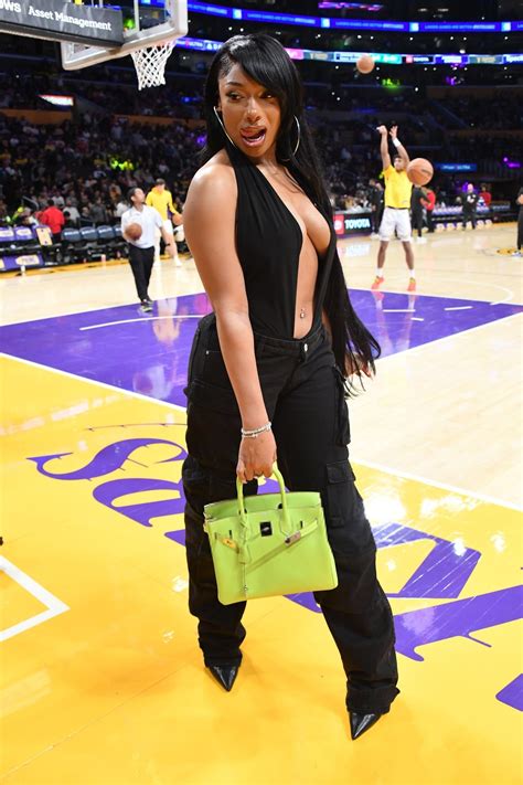 Megan Thee Stallion Captivates With Her Braless Beauty At Nba Game Hot Celebs Home