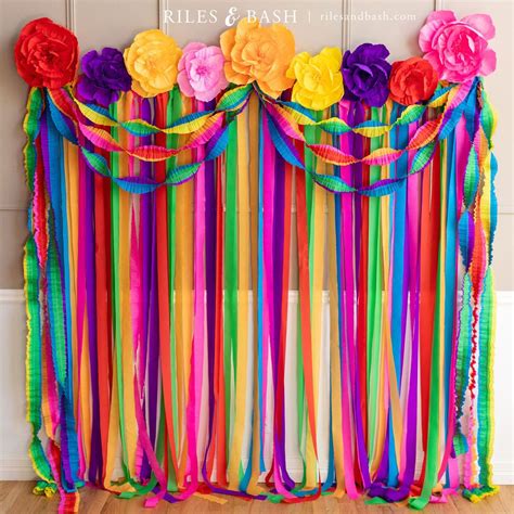 Mexican Fiesta Streamer Backdrop With Crepe Paper Fiesta Flowers And Ruffled Party Streamers