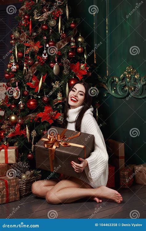 Beautiful Girl In Sweater Sitting At The Christmas Tree Ts New