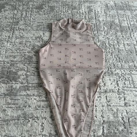 Womens Nike Air Bodysuit Never Been Worn In Depop