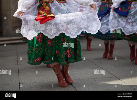 Polish folk dance group with traditional costume Stock Photo - Alamy