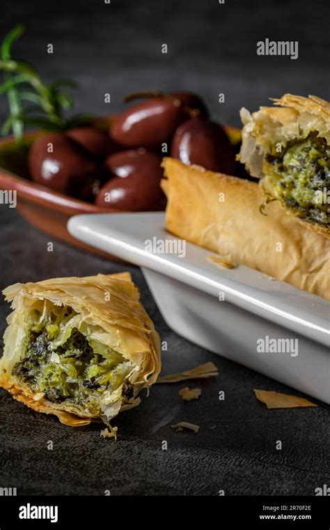 Greek spanakopita in phyllo dough. Close up shot Stock Photo - Alamy