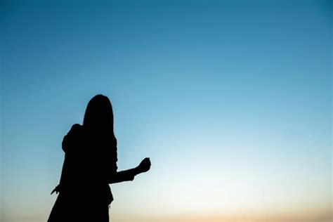 Premium Photo Silhouette Woman Hands Up In The Sky With Happiness