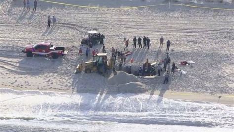 Officials Warn Bored Surfers Beachgoers About Dangers Of Digging Giant Sand Holes As Tragic