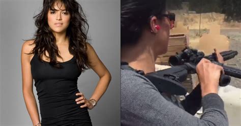 We Can T Stop Watching Badass Babe Michelle Rodriguez Go Absolutely Ham At The Firing Range Maxim