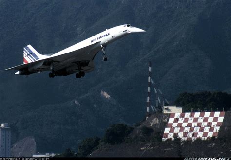 concorde landing  hong kong kai tak passing  checker board air