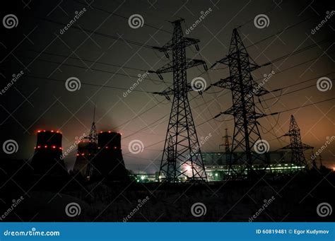 High Voltage Power Transmission Towers In Sunset Sky Stock Image