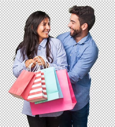 Premium Psd Young Couple Holding A Shopping Bags