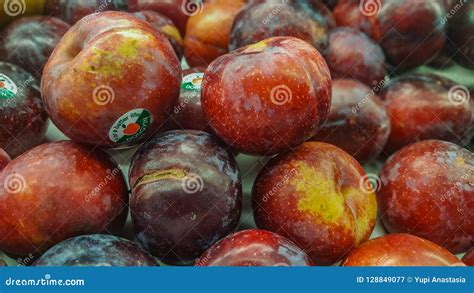 Fresh plums editorial photography. Image of retails - 128849077