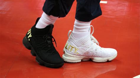 LeBron James wears 1 black shoe, 1 white shoe for 'equality' | NBA.com