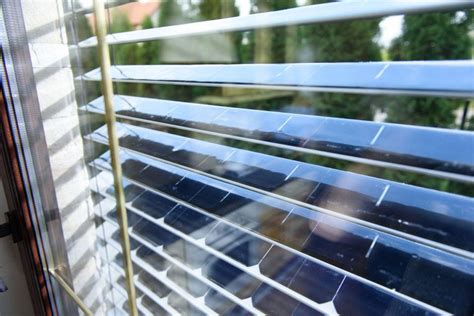 These solar panel window blinds generate energy while blocking rays ...