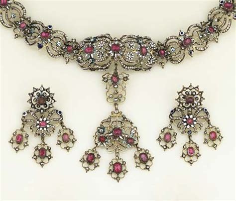 An 18th Century Enamel Foiled Rock Crystal And Seed Pearl Demi Parure