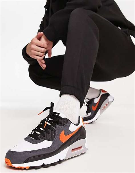 Nike air max 90 sneakers in black and orange | ASOS