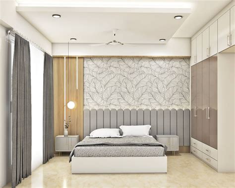 Spacious Bedroom Design With Wooden Wall Panels Livspace