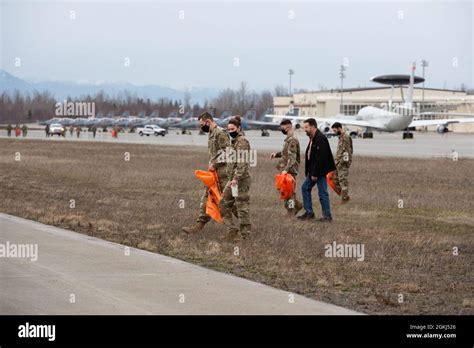 Airmen Assigned To The Rd Wing Conduct A Foreign Object Debris Walk On