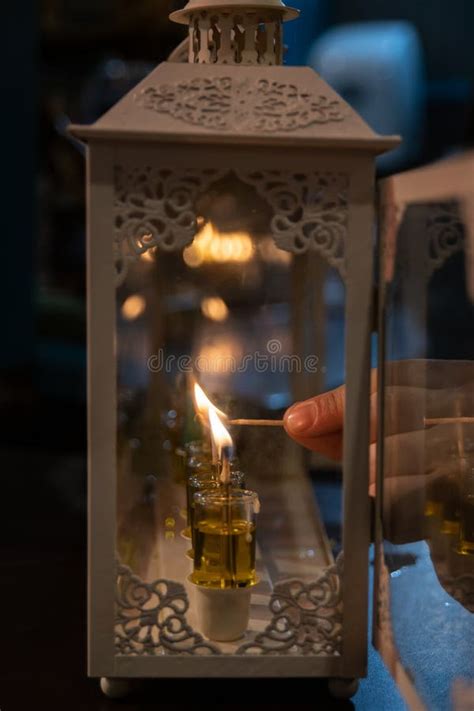 Lighting the Hanukkah Menorah Stock Photo - Image of burn, lights ...