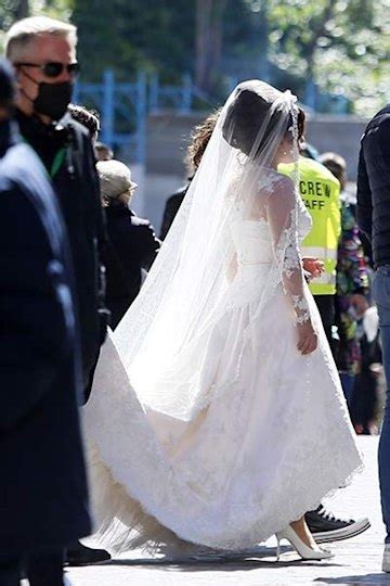 Lady Gaga looks breathtaking in stunning white lace wedding dress with ...