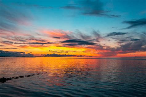 Beautiful Fiery Sunset Sky On The Beach Stock Photo Image Of Dramatic